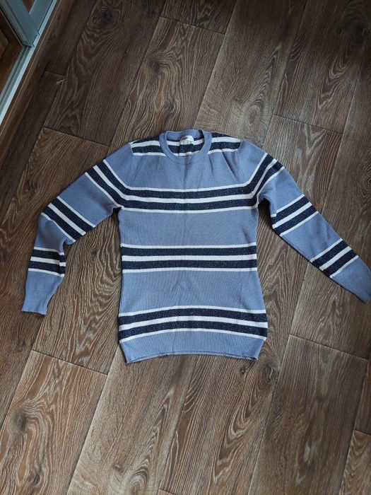 Жіночий гольф в смужку