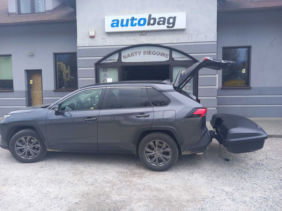 Box na hak holowniczy Thule Arcos + system nośny - duży, solidny box 450 ltrów pojemności, umożliwia przewóz nart do 180 cm długości