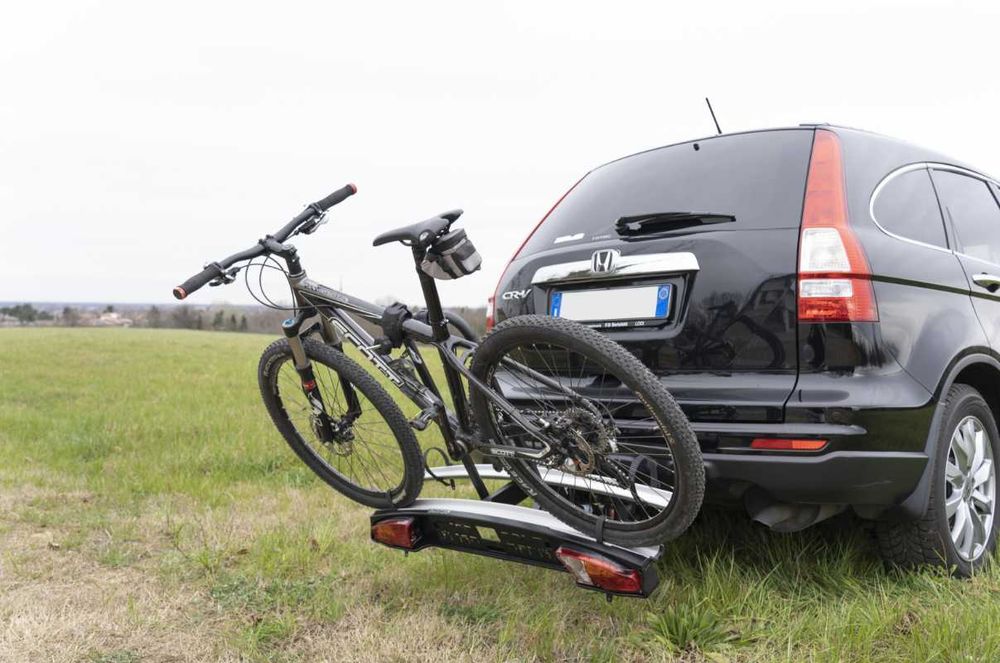 Procura um suporte de bicicletas, motas, ou boxes de carga disponha!!!