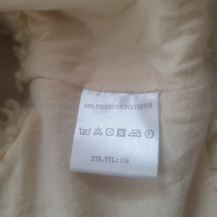 Krótka kamizelka w kwiatki