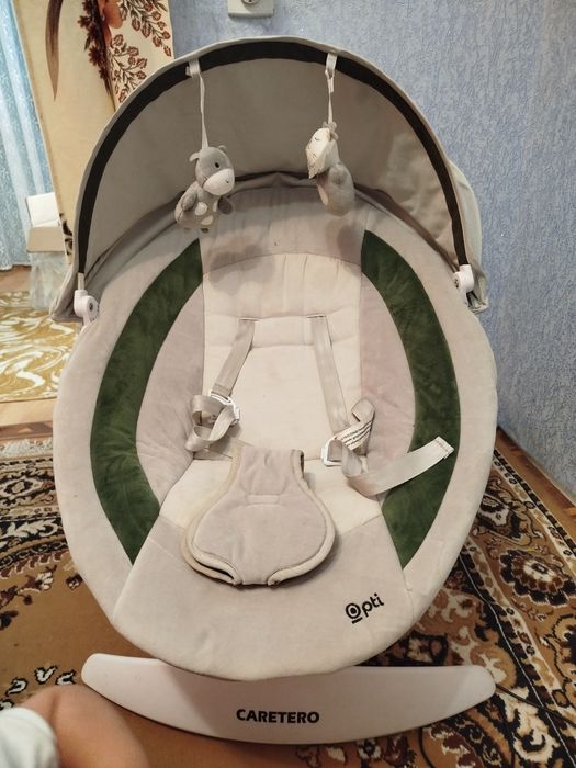 Заколисуючий центр Caretero Opti