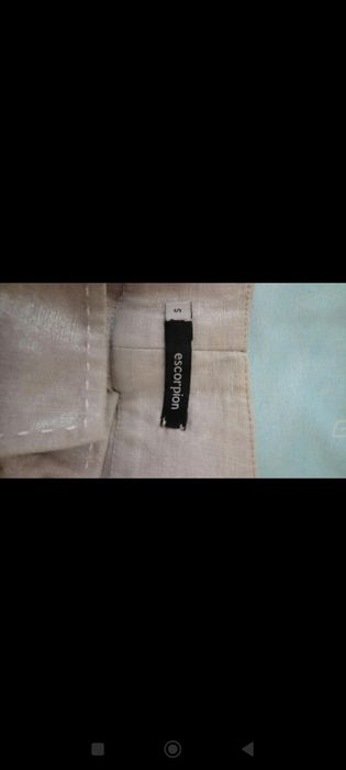 Calça em linho prateadas