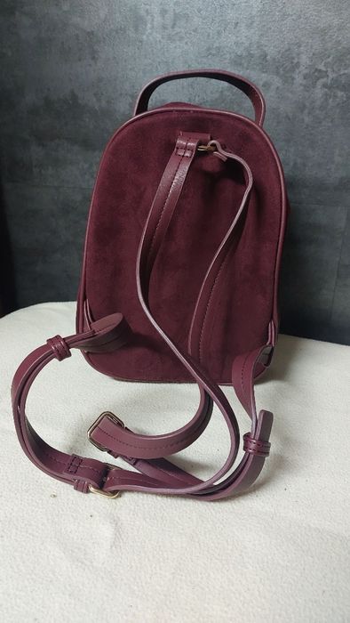 Mochila de camurça bordô