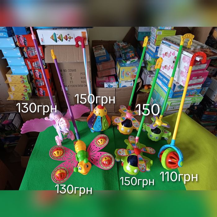 Каталка на палочці вертоліт машинка куля дзвоник брязкальце