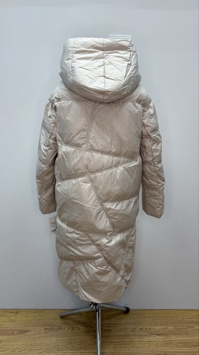 Жіночий подовжений пуховик, є різні розміри CLASNA