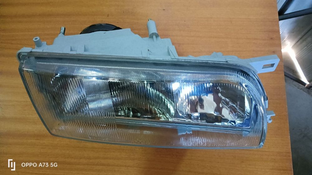 Farol Nissan Primera ótica 1990 direita