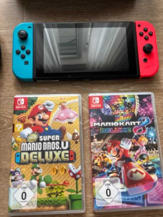 Nintendo Switch + Dock + 2 gry + etui | Stan bardzo dobry