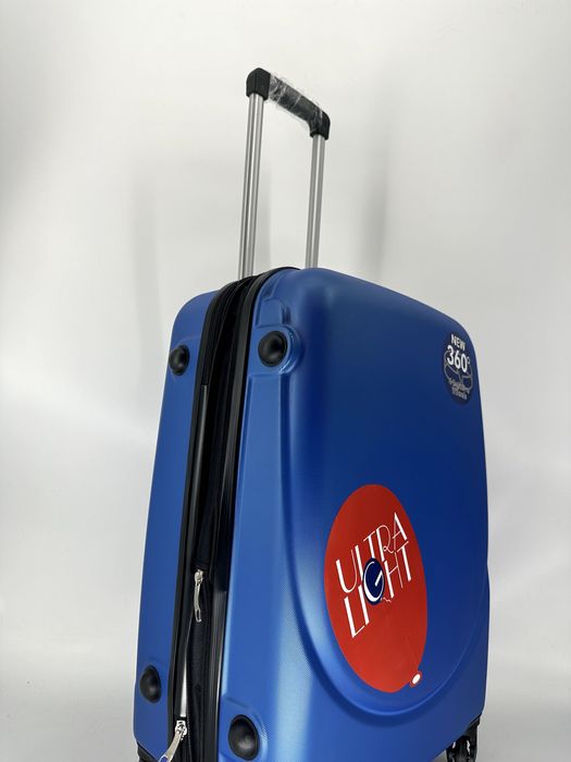 Nowa walizka średnia chabrowa, niebieska