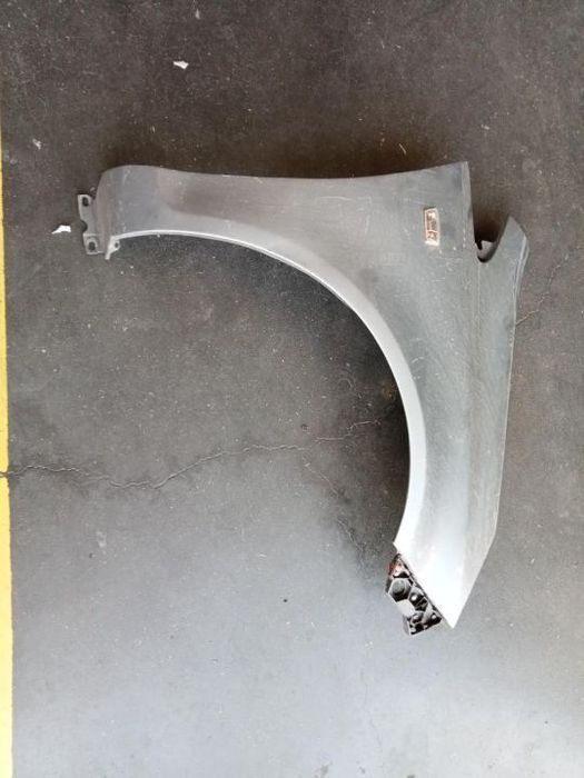 Guarda lamas direito Opel Corsa D 06-