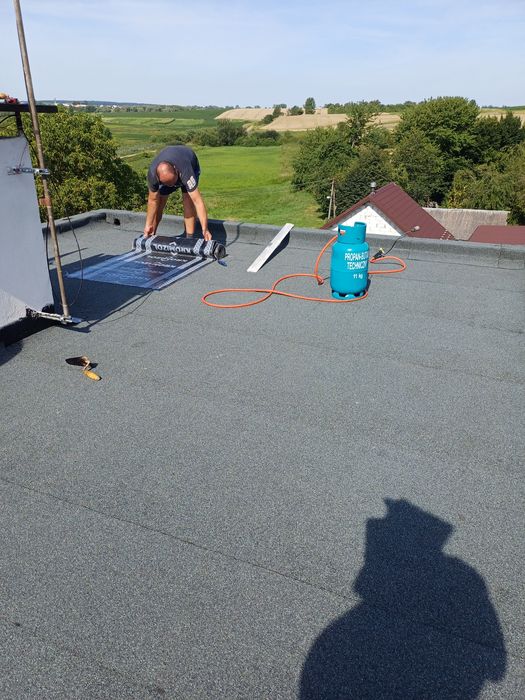 Покрівля дахів євро рубероїдом