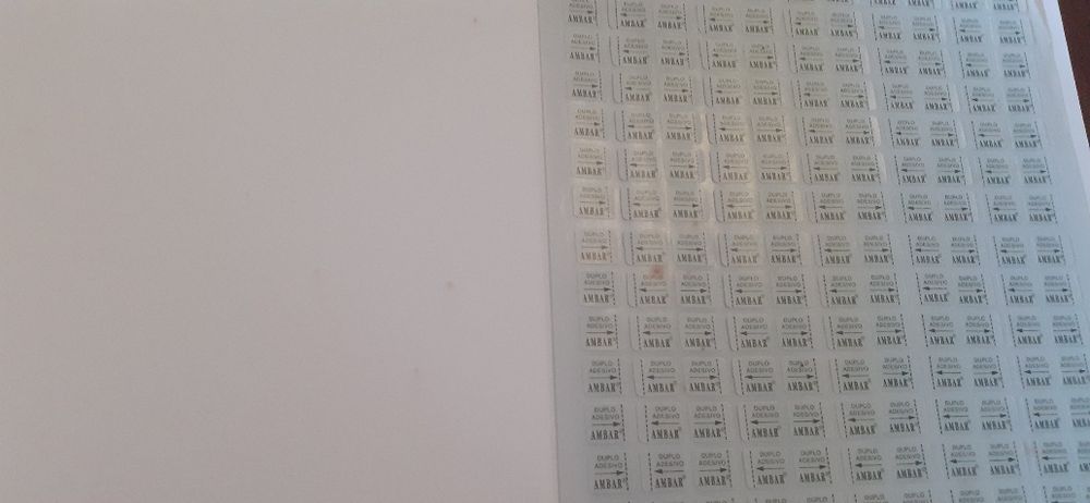 Álbuns de fotos novos em caixa