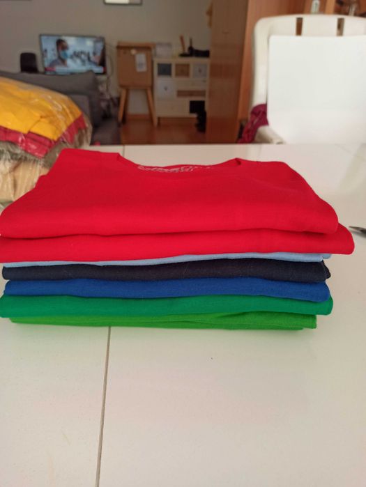 Pack com 49 T-Shirts novas, prontas para personalizar.