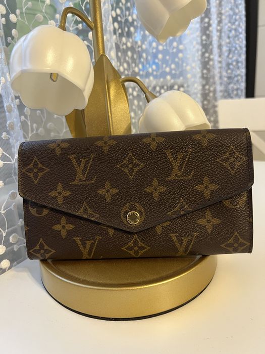 Nowy nieuzywany portfel louis vuitton model  sarah monogram