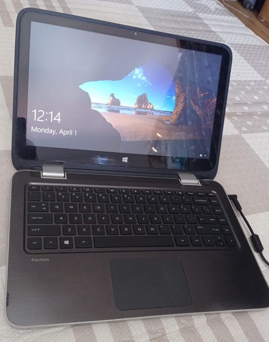 Hp i3-4030U laptop with charger,4 GB ram/128 GB SSD windows 10.