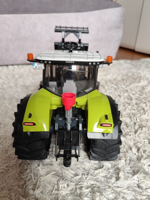 Bruder class axion 950 z ładowaczem jak nowy