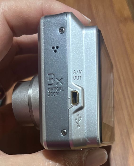 GPS tomtom e máquina fotográfica