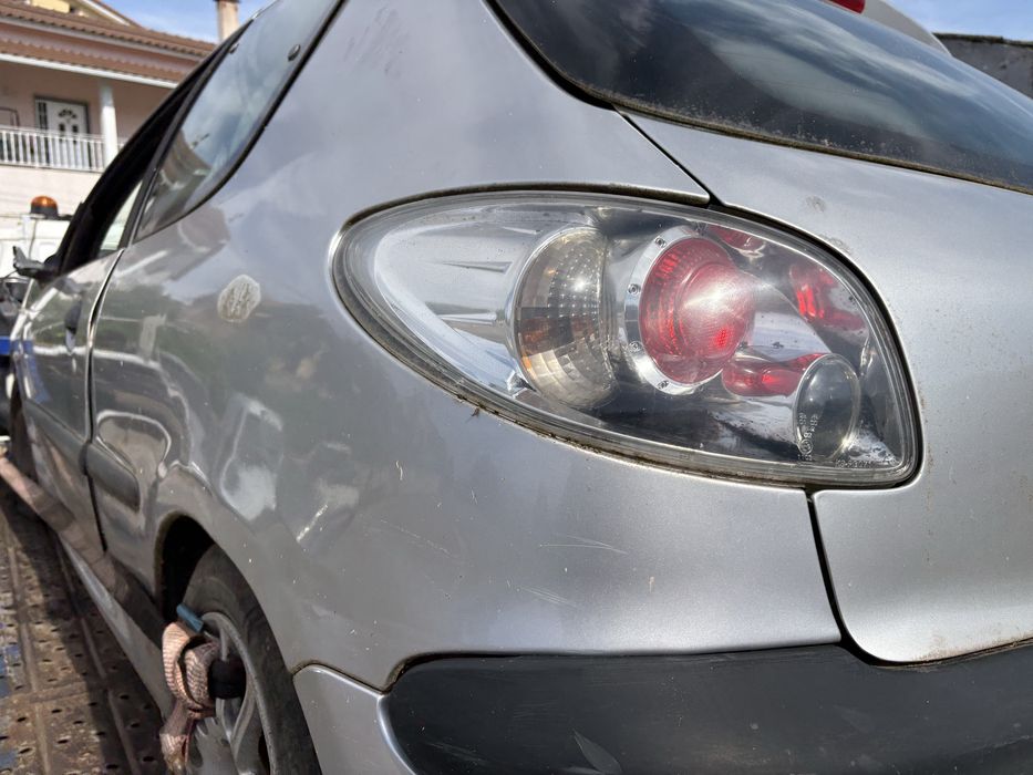 Farolim esquerdo Peugeot 206