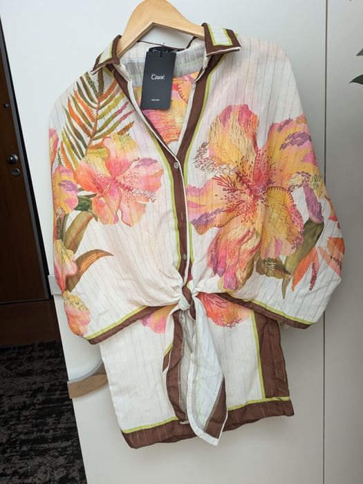 Fato CAWÉ com etiqueta