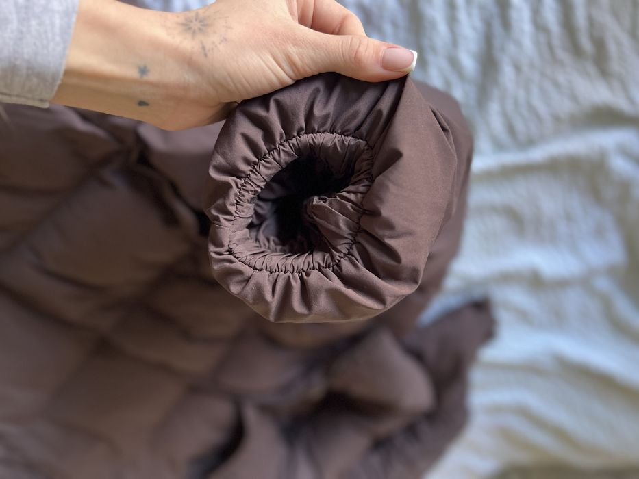 Коричневий пуховик estro