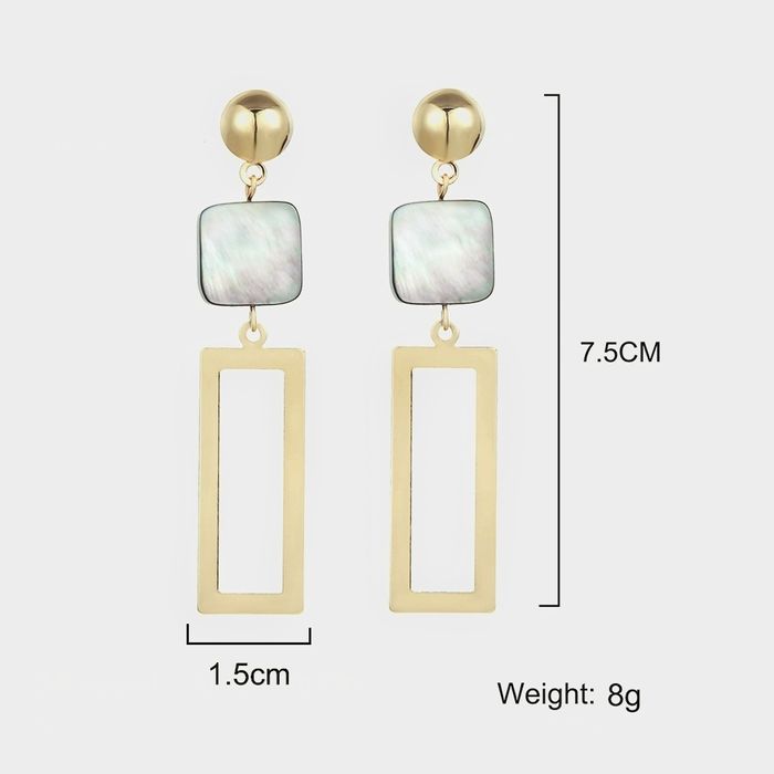 Довгі золотисті сережки з перламутровим  камінчиком