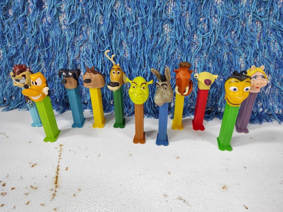 Kinas (Euro 2004) / Gil (Expo 98) / Pez - Shrek, Idade Gelo, Pluto / Benfica - livros, emblema