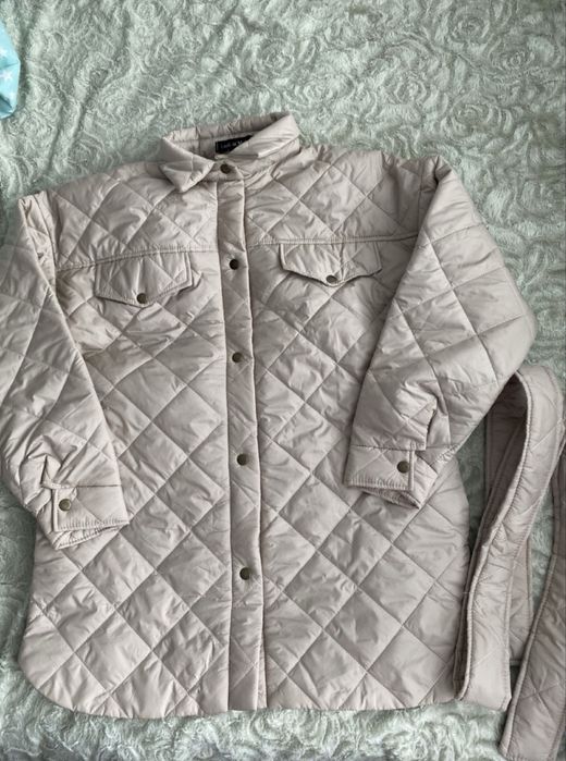 Куртка нова, стьогана