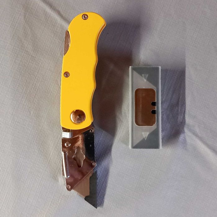 Cúter plegable acero. Inoxidable