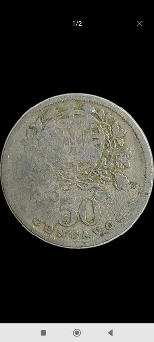 Moeda antiga de 50 centavos da república portuguesa do ano 1929 .