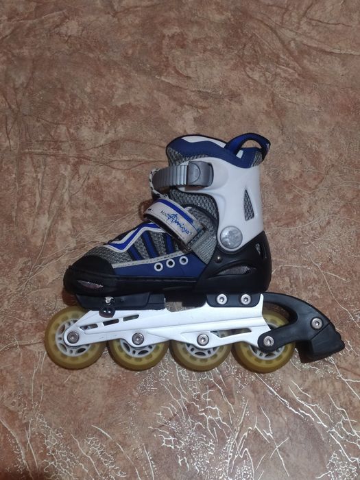 Роликовые коньки