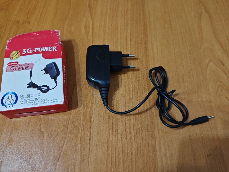 Зарядний пристрій для мобільного телефону