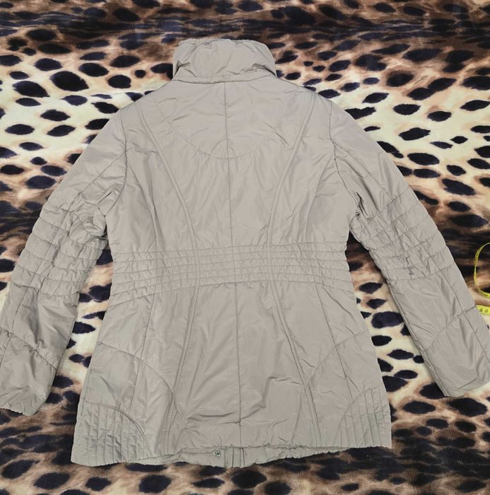 Жіноча фірмова куртка XL