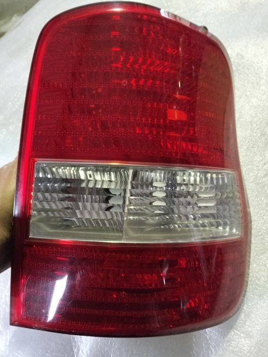 Farolim Kia carnival original Kia sedona 2002  DRT