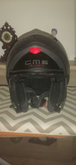 Vende se casaco de moto e capacete