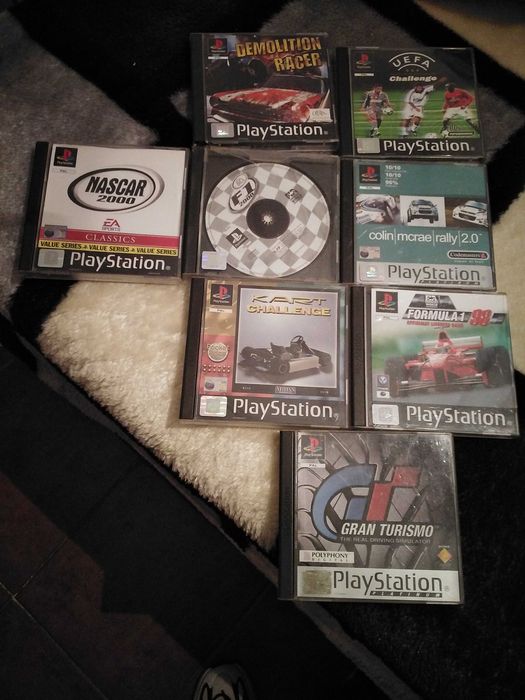 PS1 with controller and cables and games64730299946881121