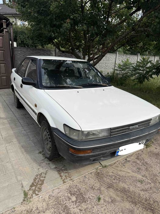 Тойота Королла е90