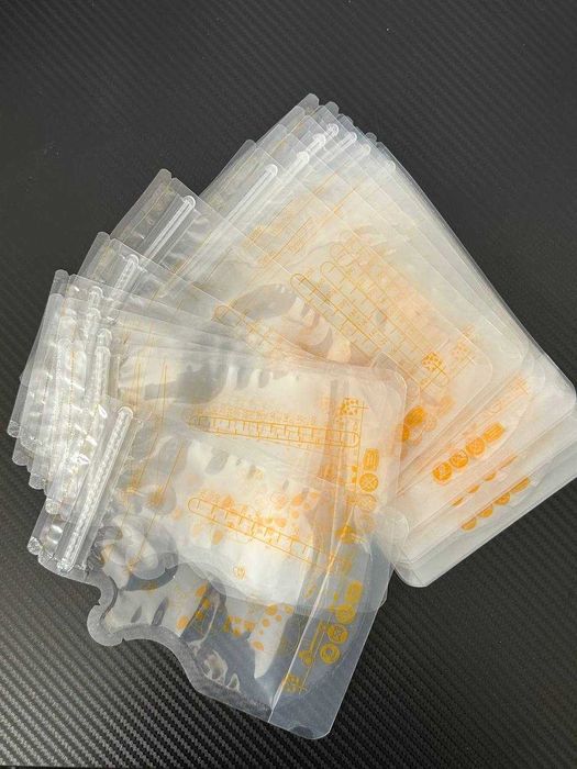 Молоковідсмоктувач Wearable Electric Breast Pump + пакети для зберіг.