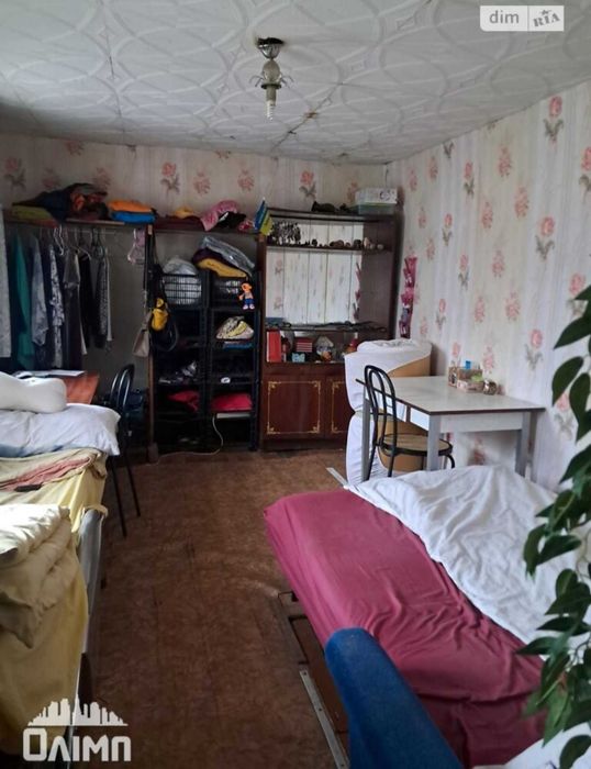 Продам пів будинку в топовом місці на вул.Кармелюка 0962