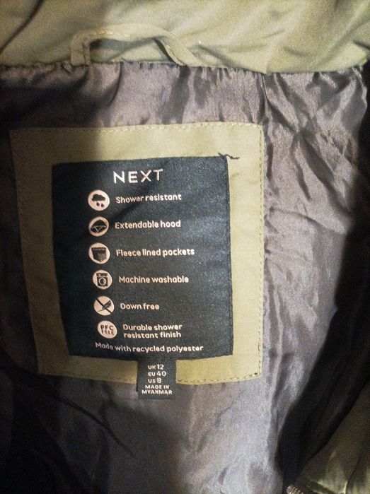 Продам новый пуховик Next р.52-54