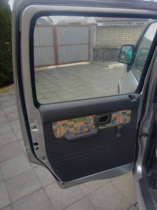 Двері автомобільні Сузукі вагон