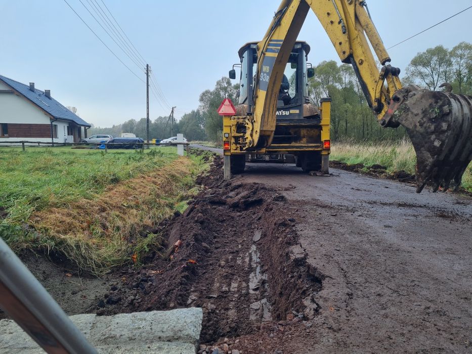 Usługi koparko- ładowarką. Wykopy pod fundamenty, niwelacja, kucie.