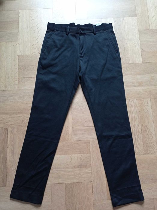 Spodnie materiałowe męskie Reserved