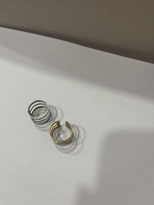 par de aneis de prata