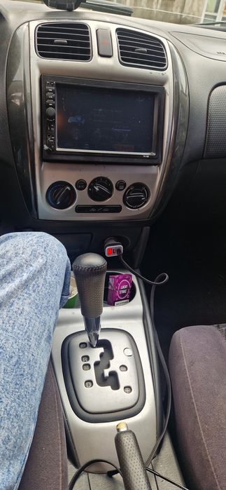 Мазда 323 Protege5 GXI