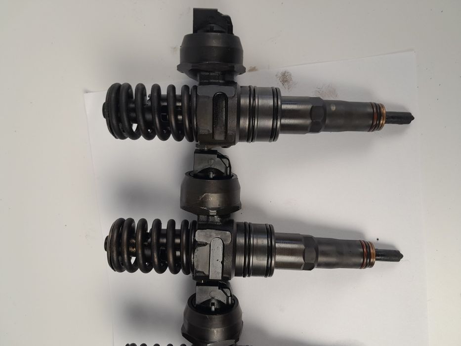 Комлект насос форсунок 2.0TDI VW Touran Caddy 2003-2010p 038130073BQ