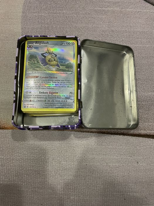 Cartas pokemon com caixa metalica