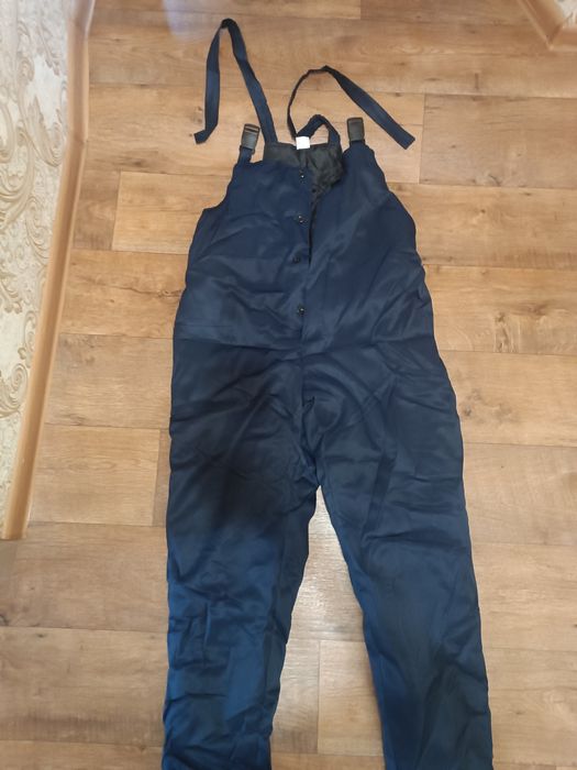 Продам рабочий мужской комбинезон теплый.