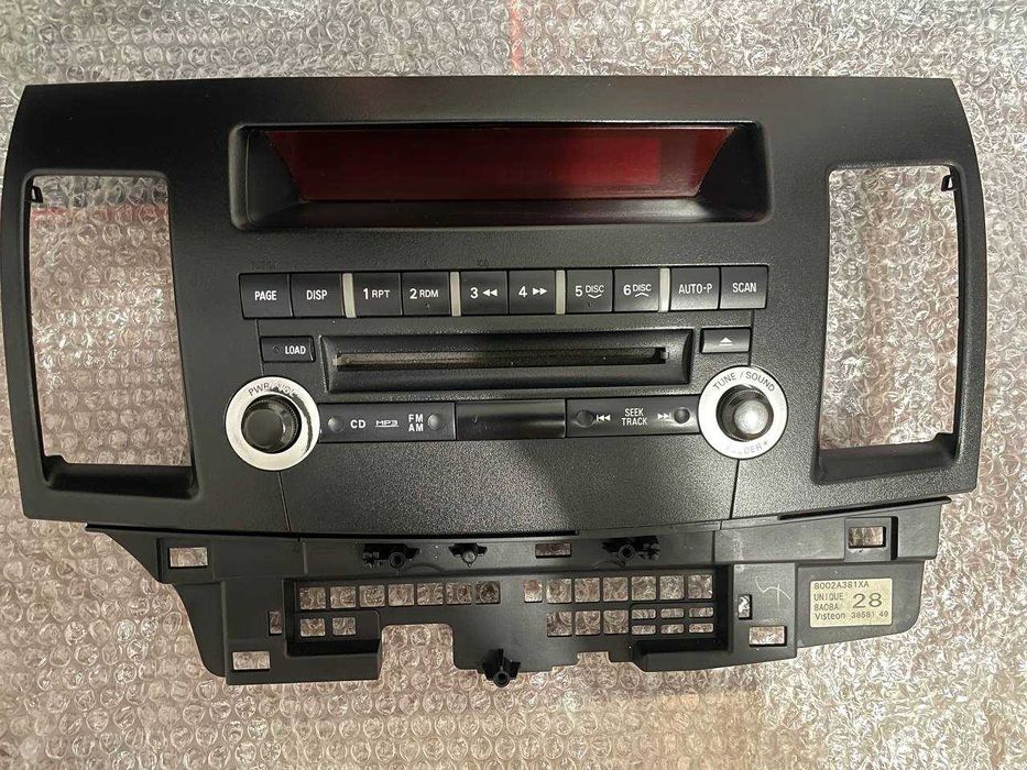 Штатна магнітола Mitsubishi Lancer X + панель (рамка)