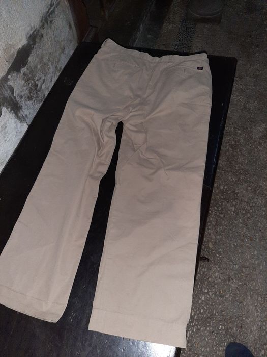 Calças beje bxl...