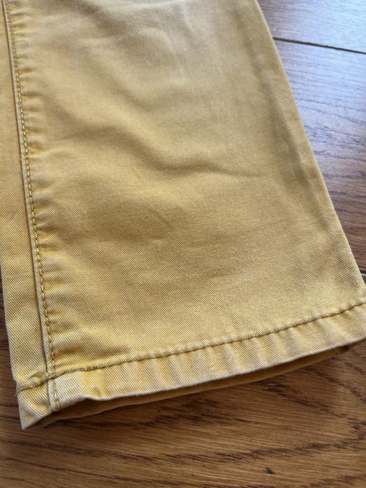 Żółte spodnie dżinsowe H&M r.110