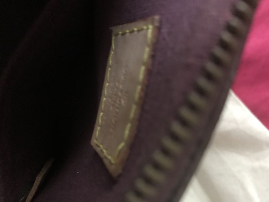 Malinha de mão da Coach